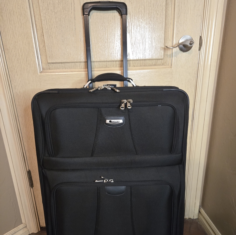 Delsey large expandable rolling suitcase